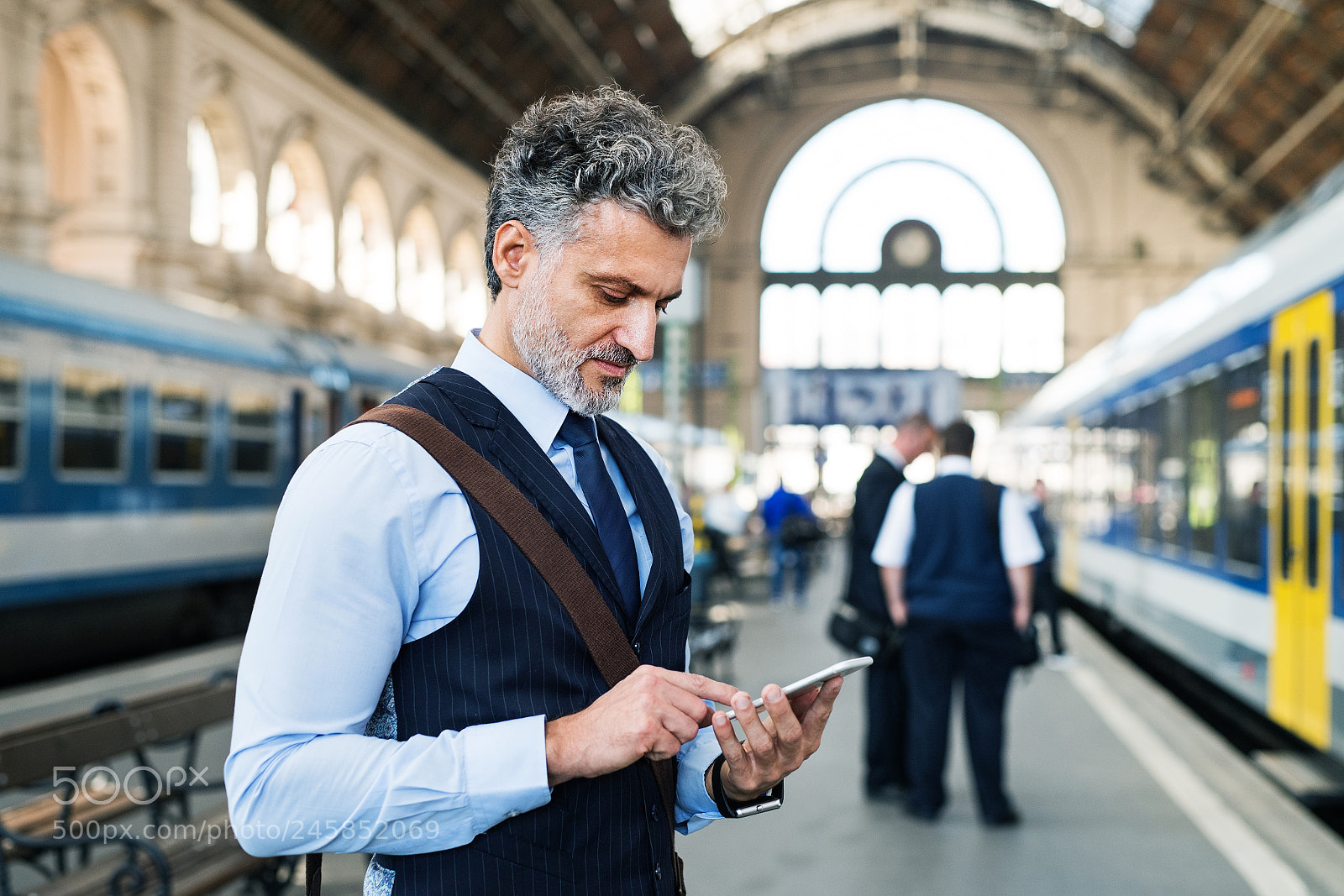 Nikon D5 sample photo. Mature businessman with smartphone photography