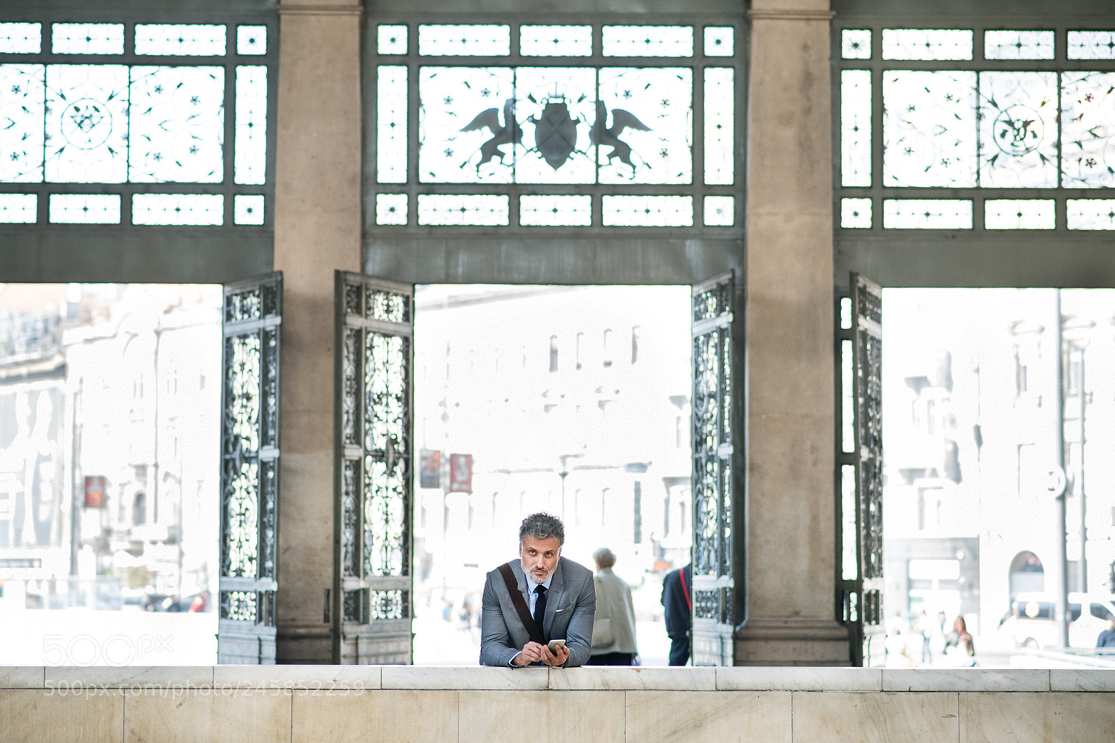 Nikon D5 sample photo. Mature businessman with smartphone photography