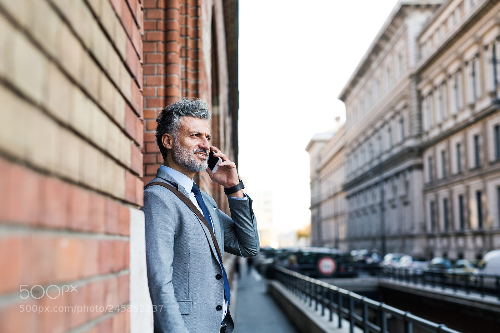 Nikon D5 sample photo. Mature businessman with smartphone photography
