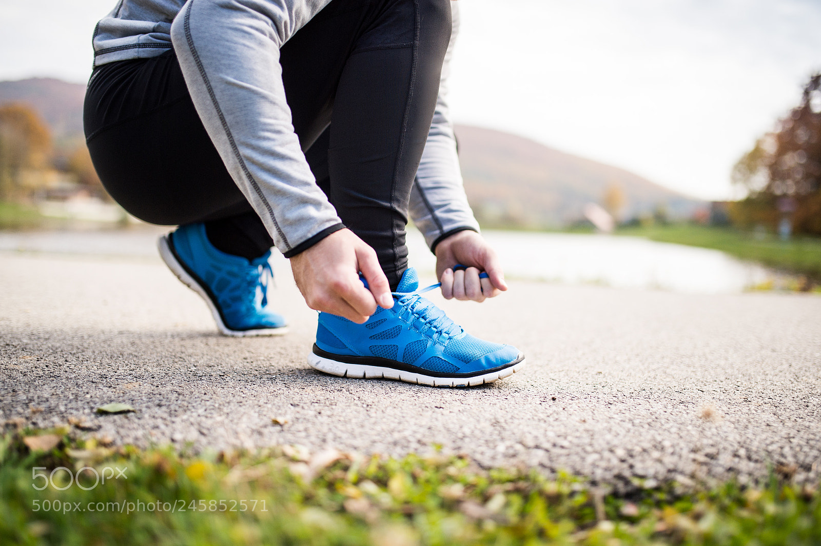 Nikon D4S sample photo. Unrecognizable young runner tying photography