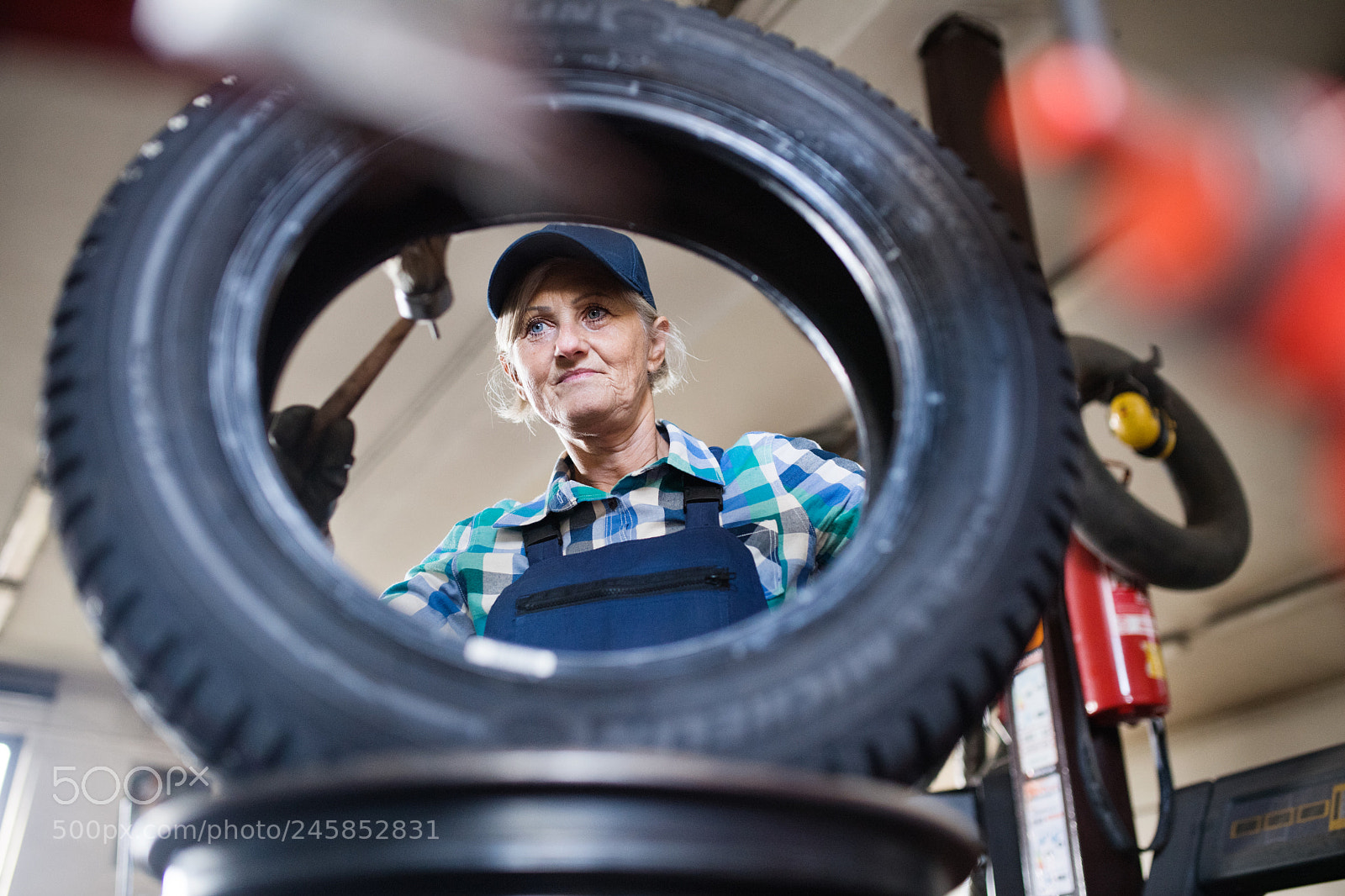 Nikon D5 sample photo. Senior female mechanic repairing photography