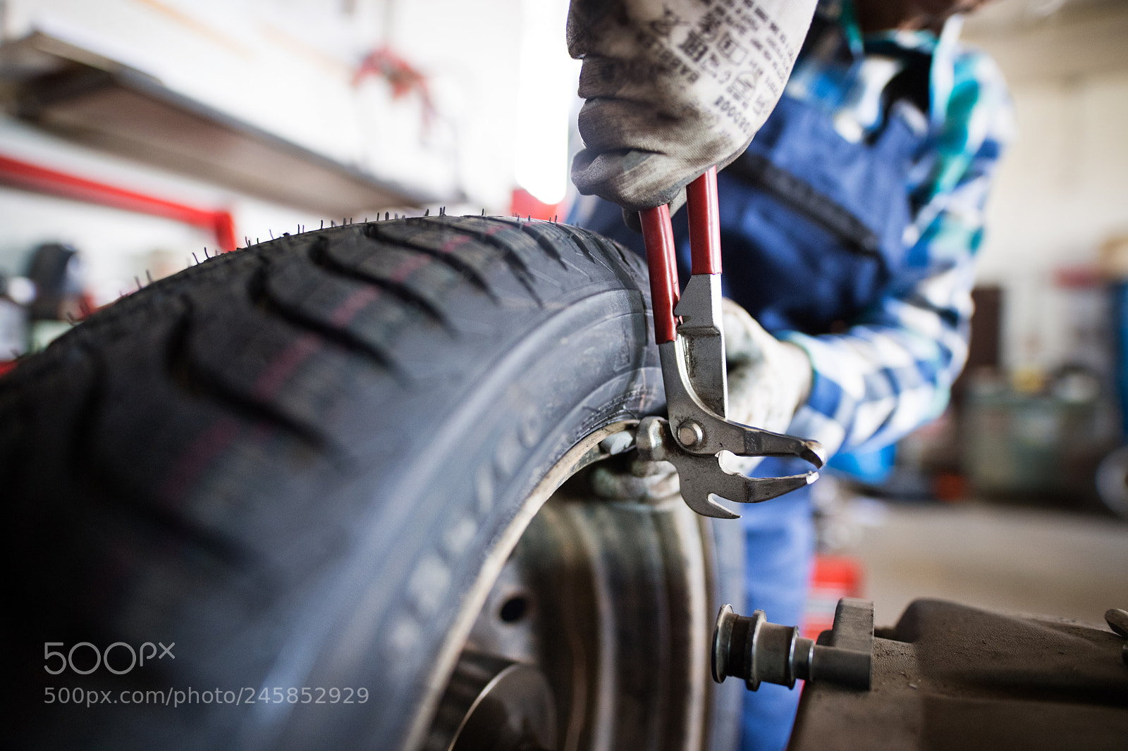 Nikon D5 sample photo. Senior female mechanic repairing photography