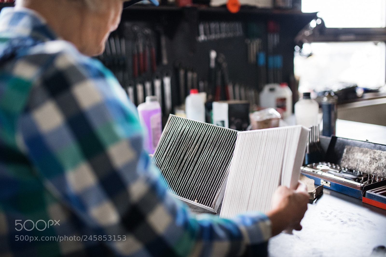 Nikon D5 sample photo. Senior female mechanic repairing photography
