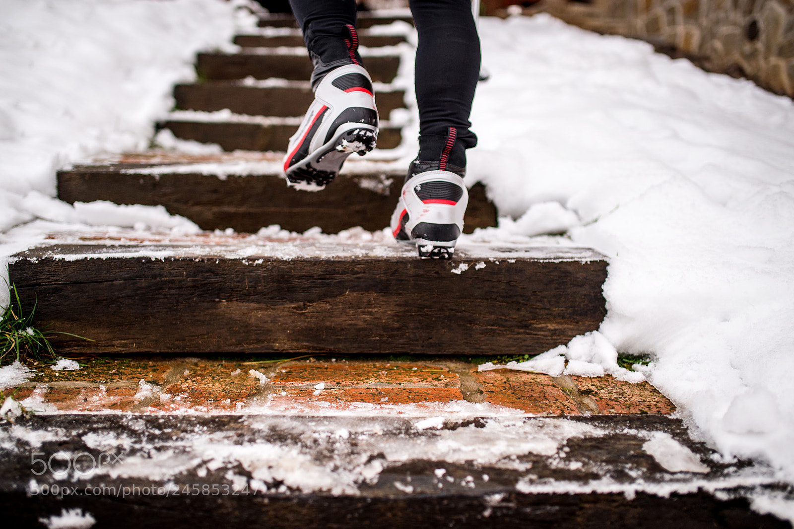 Nikon D4S sample photo. Feet of unrecognizable cross-country photography