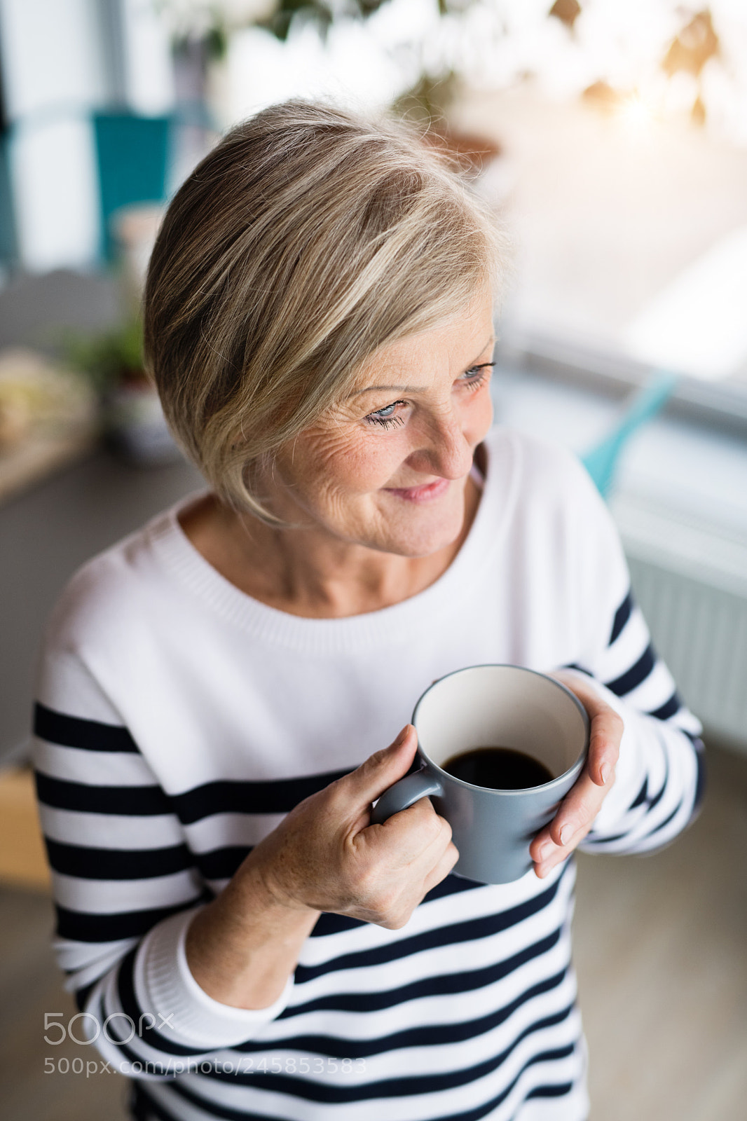 Nikon D5 sample photo. Senior woman holding a photography