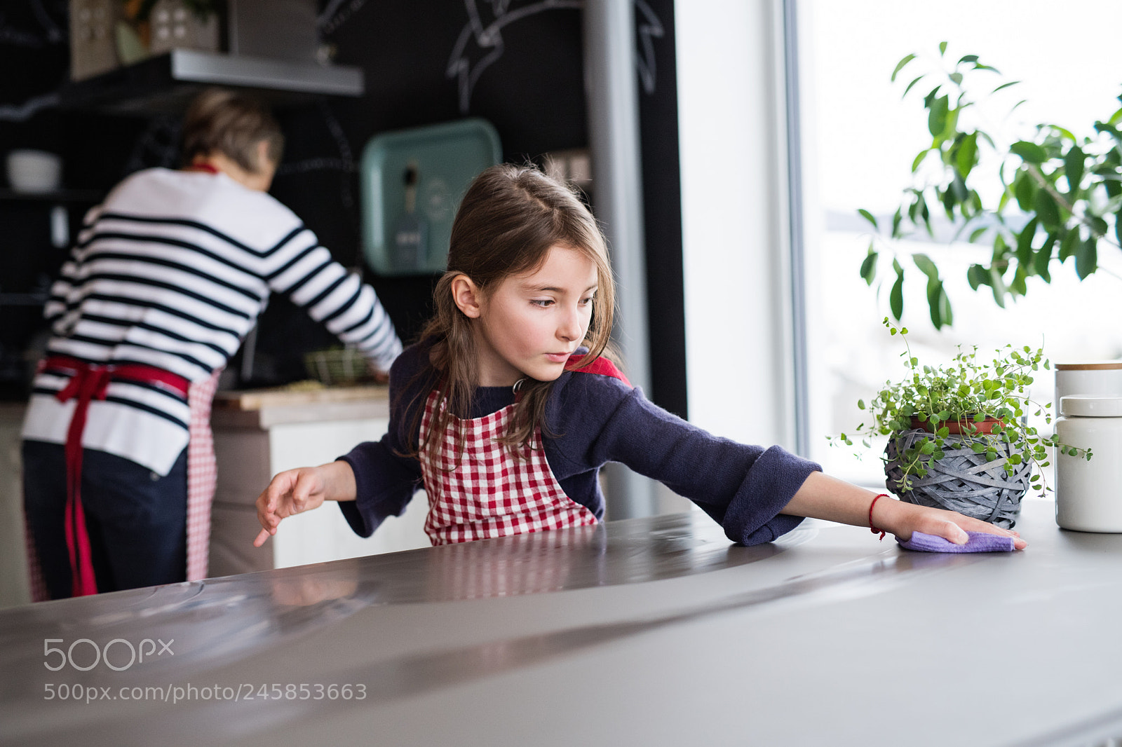 Nikon D5 sample photo. A small girl cooking photography