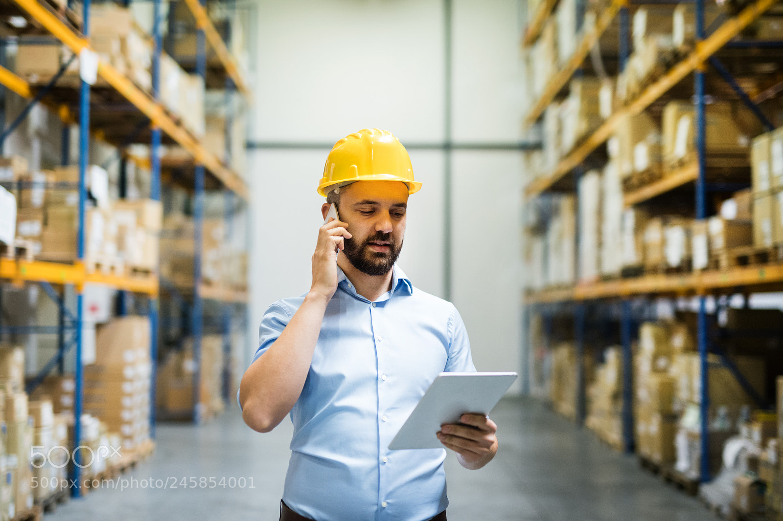 Nikon D5 sample photo. Warehouse worker or supervisor photography