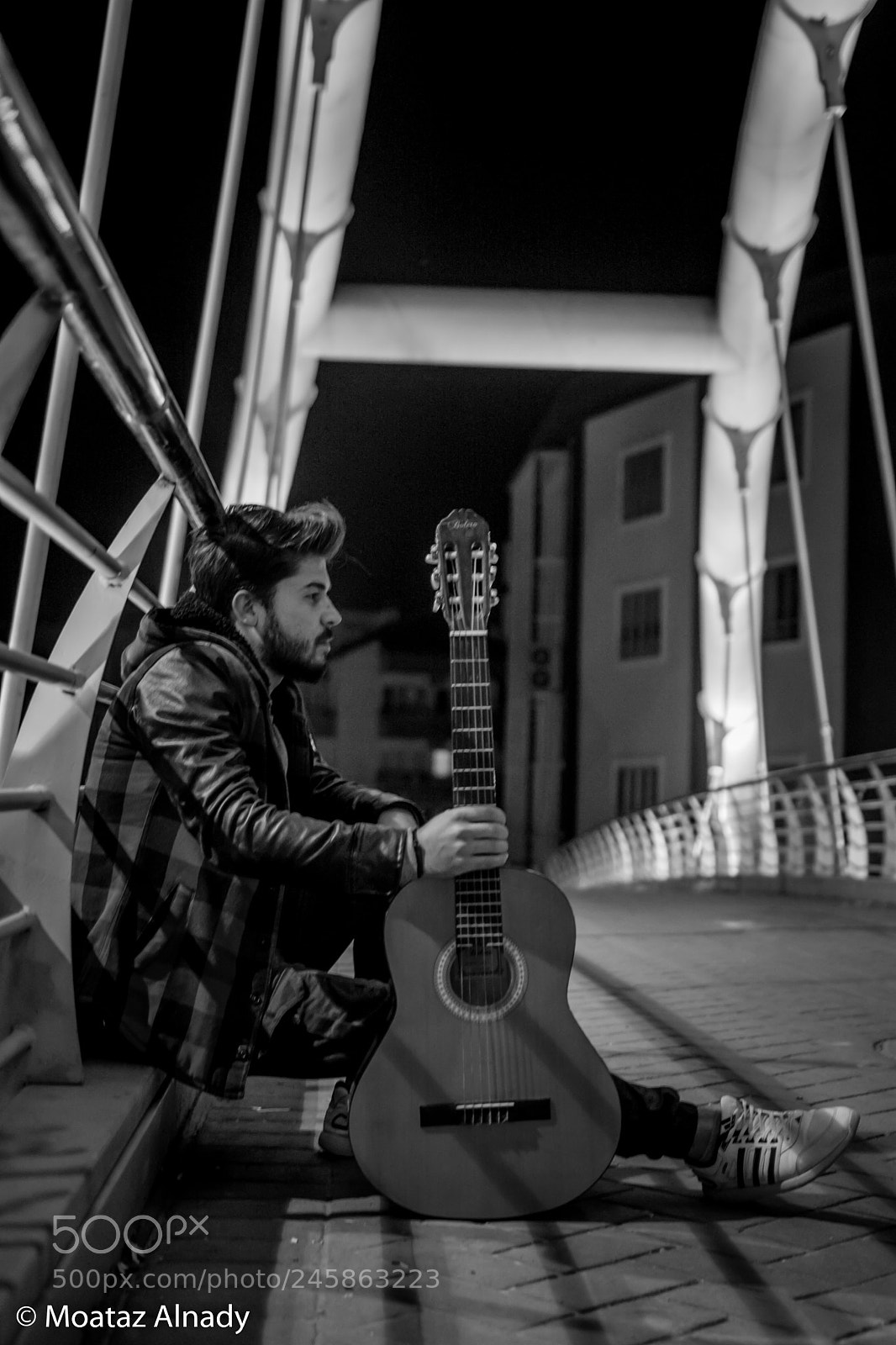 Nikon D5200 sample photo. Lonely musician photography
