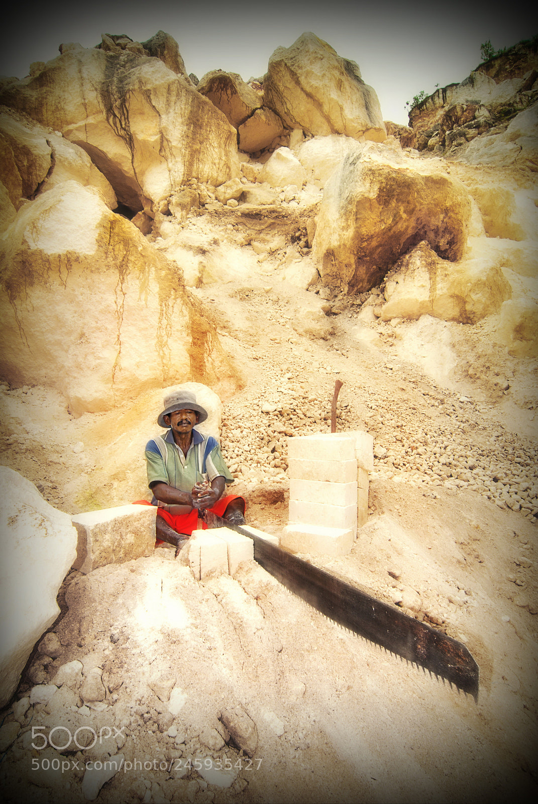 Nikon D200 sample photo. Sawing the stones photography