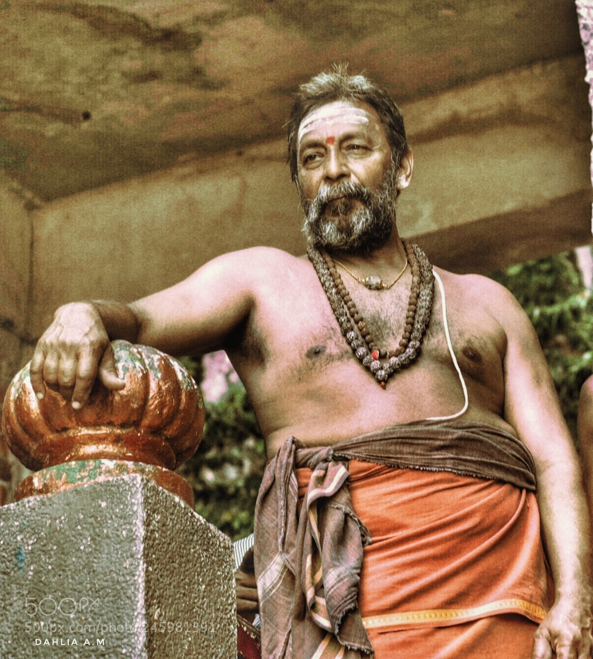 Olympus OM-D E-M10 sample photo. Man of the temple photography