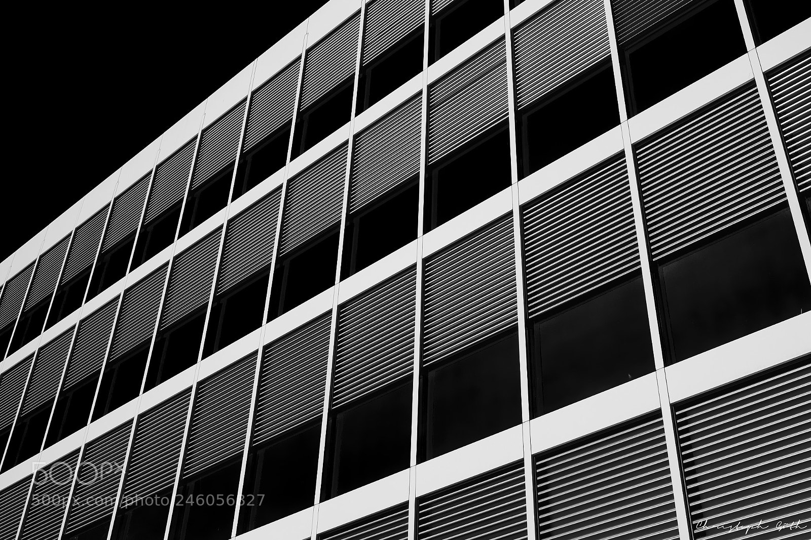 Sony Cyber-shot DSC-RX10 III sample photo. Lines on building photography