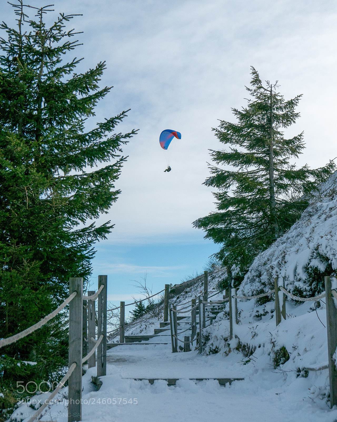 Panasonic Lumix DMC-LX100 sample photo. A paraglider flies between photography