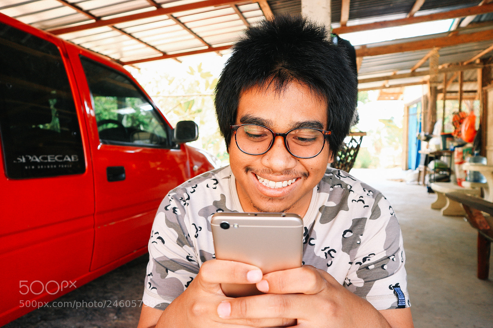 Canon EOS M10 sample photo. Brown skin soldier smile photography