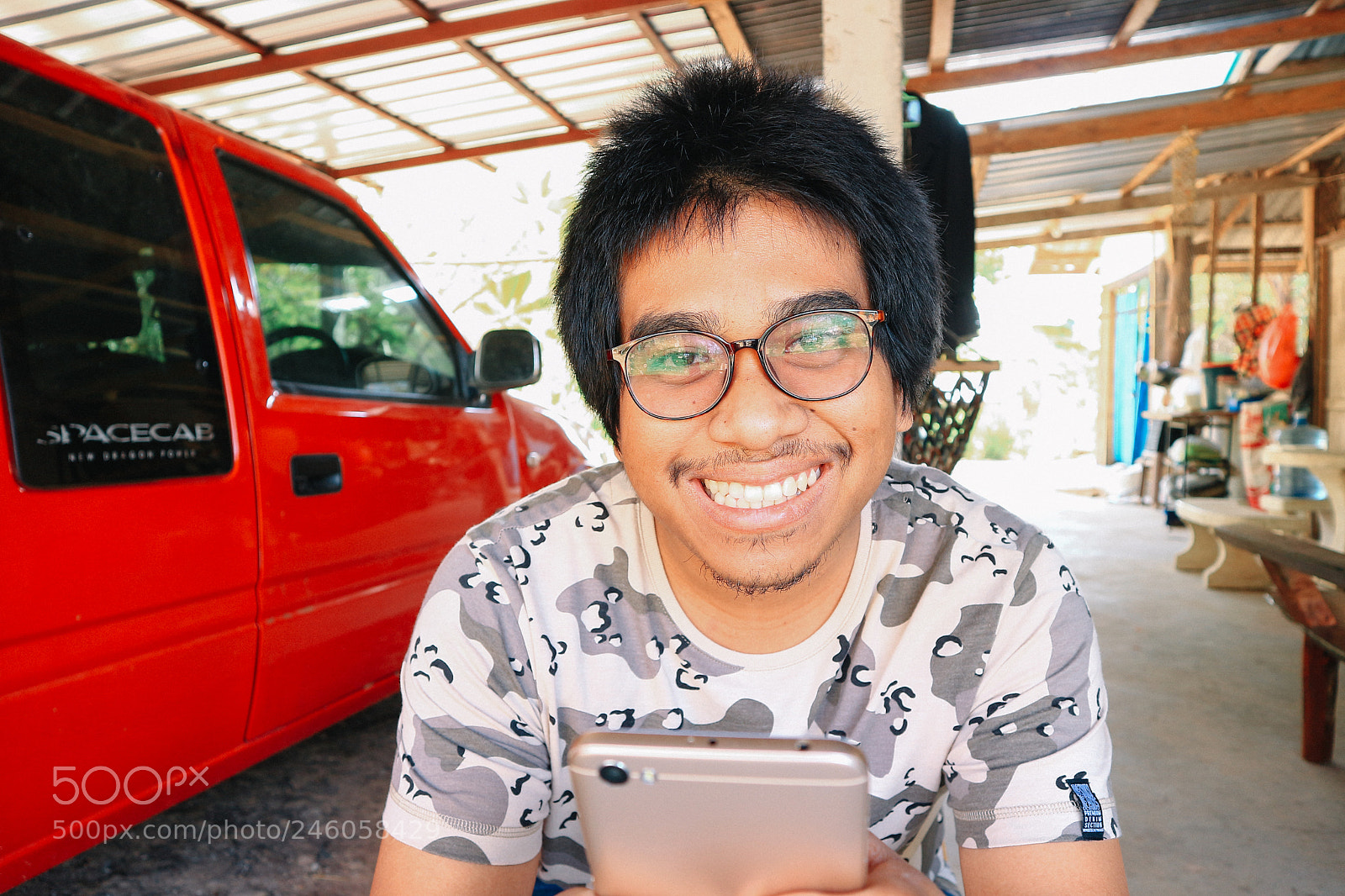 Canon EOS M10 sample photo. Brown skin soldier smile photography