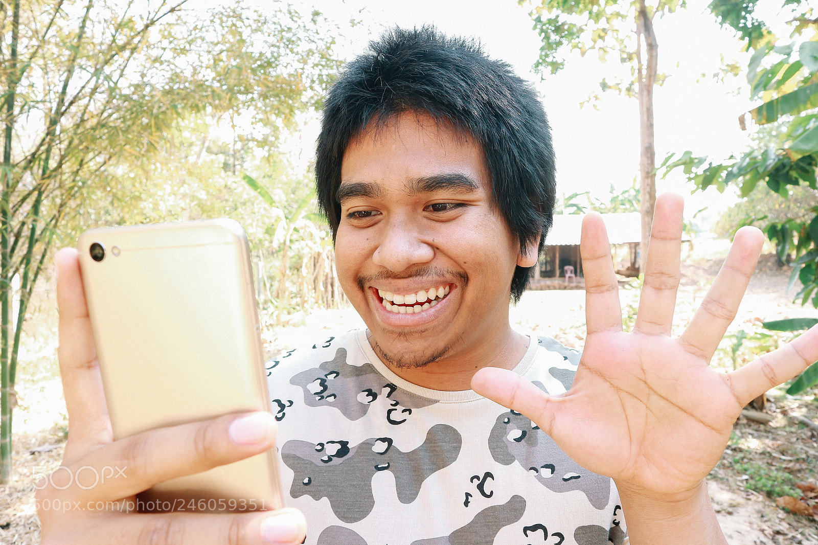 Canon EOS M10 sample photo. Brown skin soldier smile photography