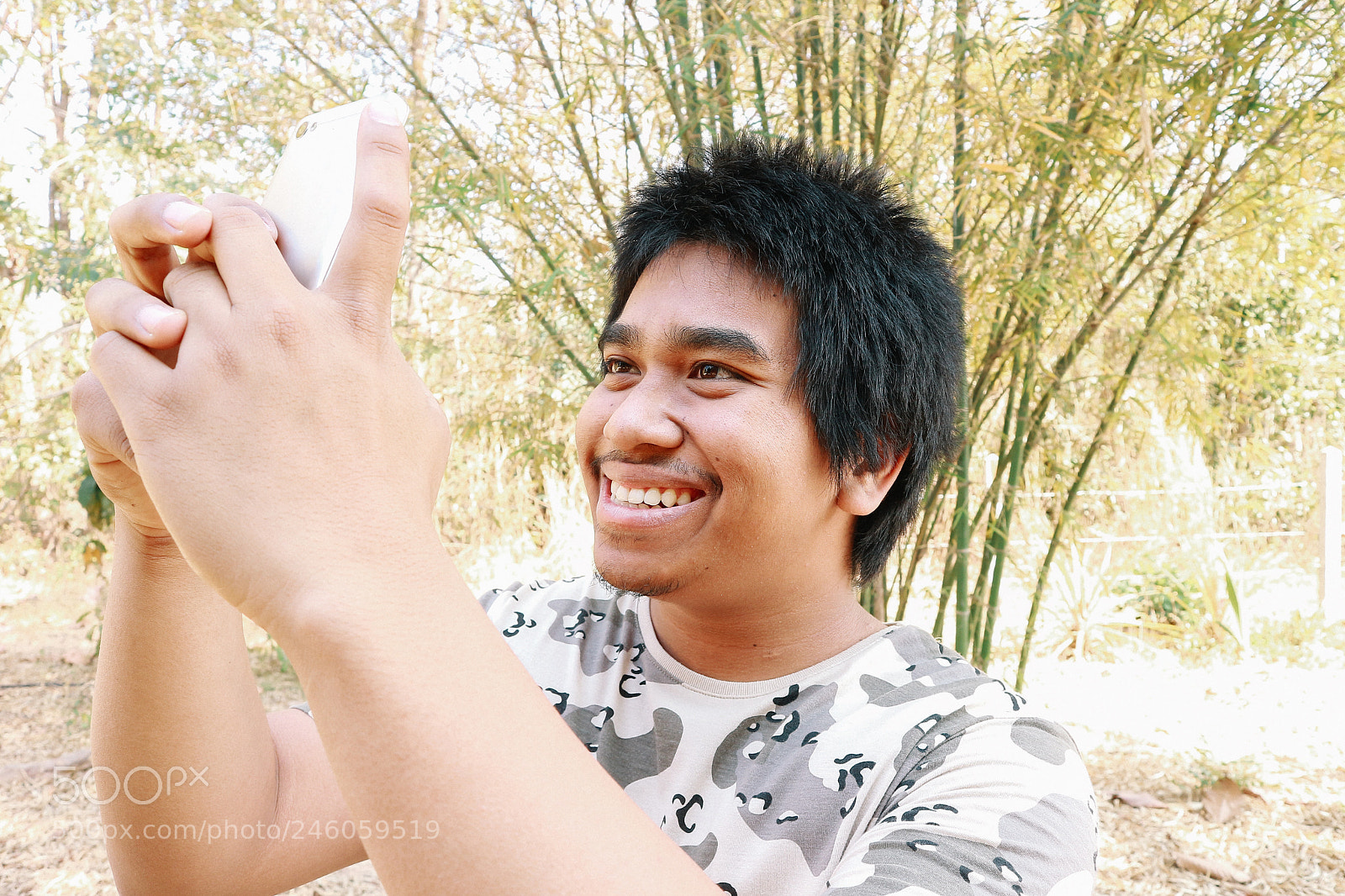 Canon EOS M10 sample photo. Brown skin soldier smile photography
