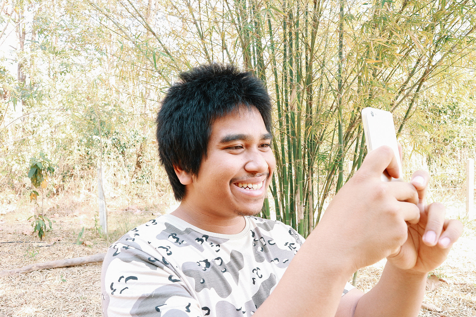 Canon EOS M10 sample photo. Brown skin soldier smile photography