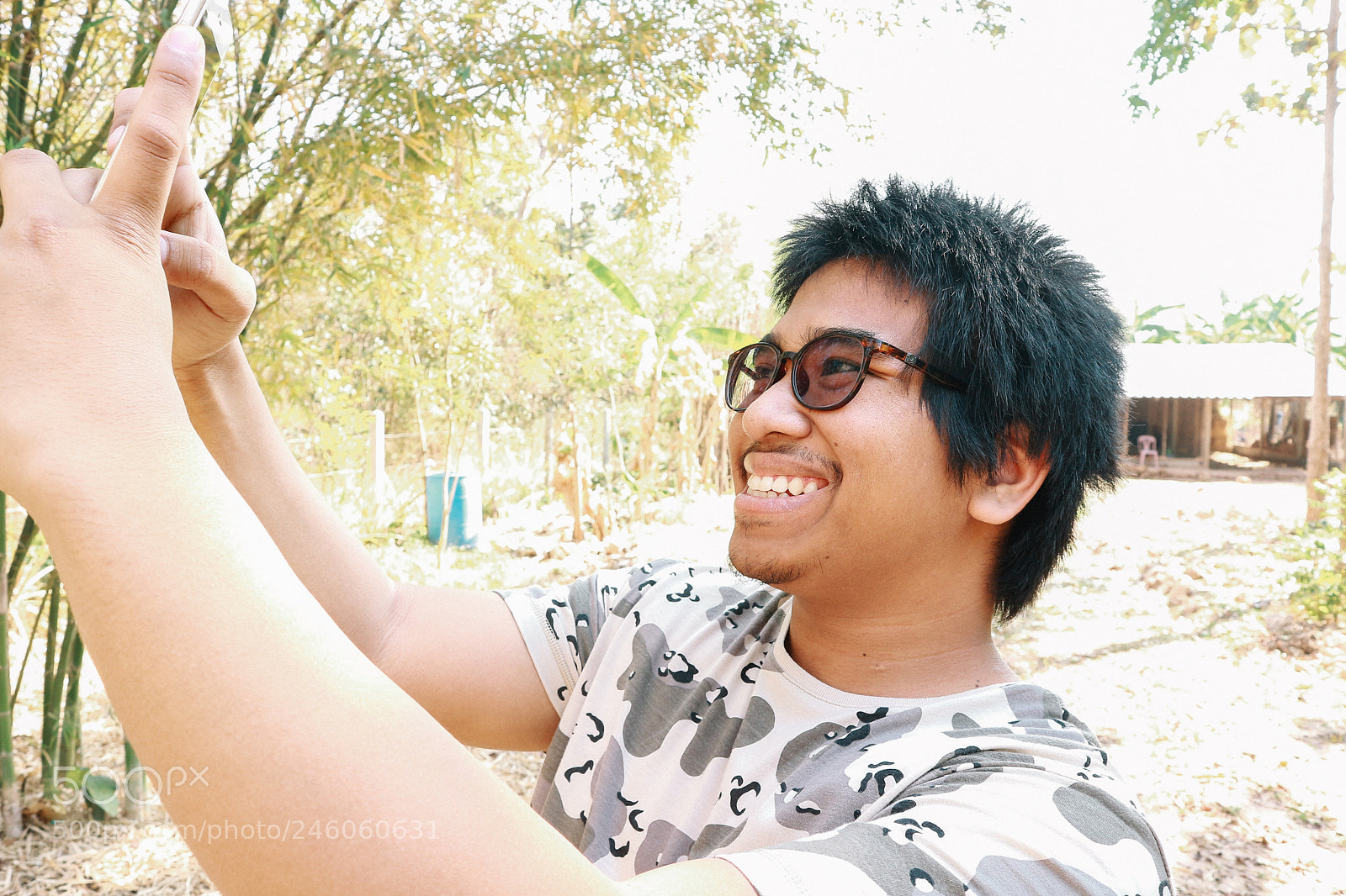 Canon EOS M10 sample photo. Brown skin soldier smile photography
