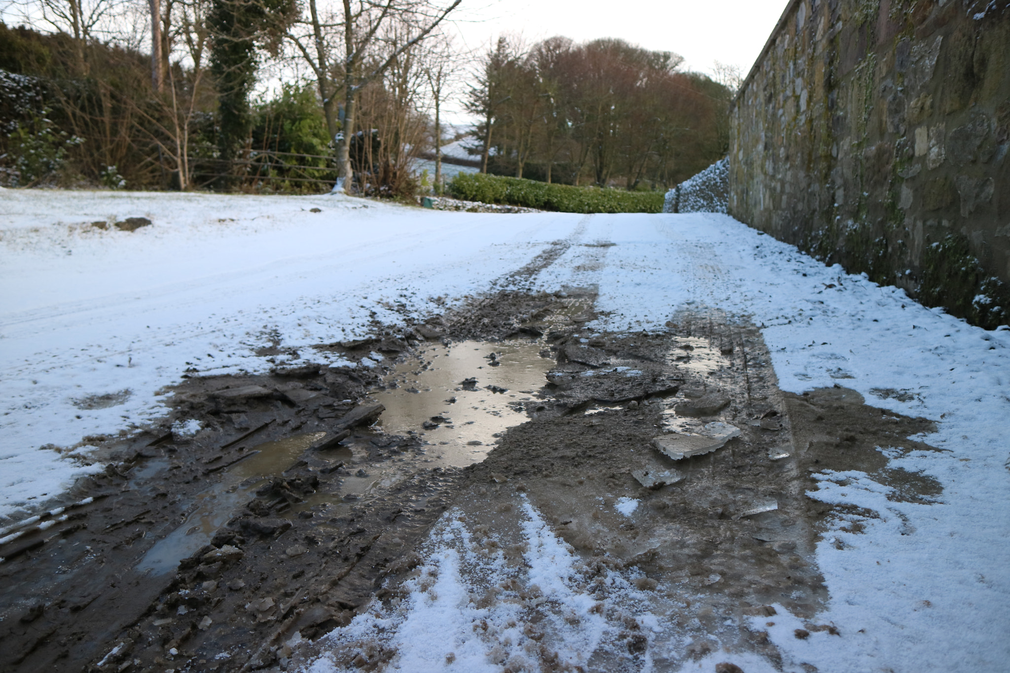 Canon EOS M3 sample photo. Muddy puddle in the snow photography