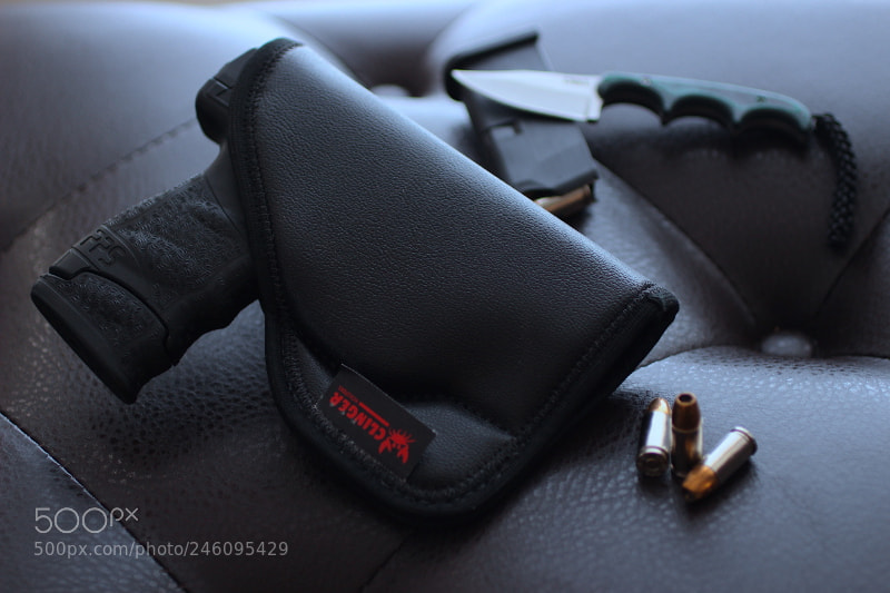 Canon EOS 100D (EOS Rebel SL1 / EOS Kiss X7) sample photo. Concealed carry holster by photography