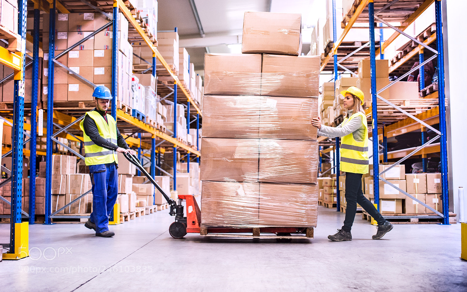 Nikon D4S sample photo. Warehouse workers pulling a photography