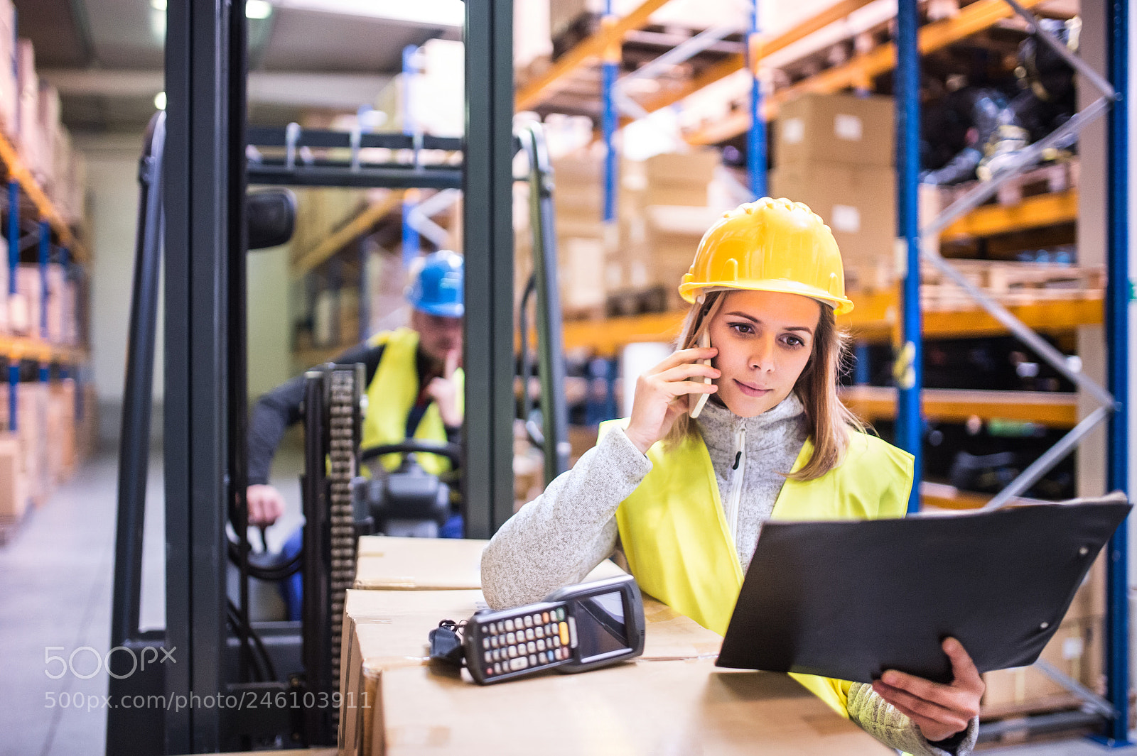 Nikon D4S sample photo. Warehouse workers with smartphone photography