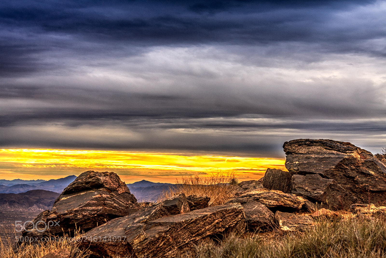 Canon EOS 40D sample photo. Sunrise rocks with stormy photography