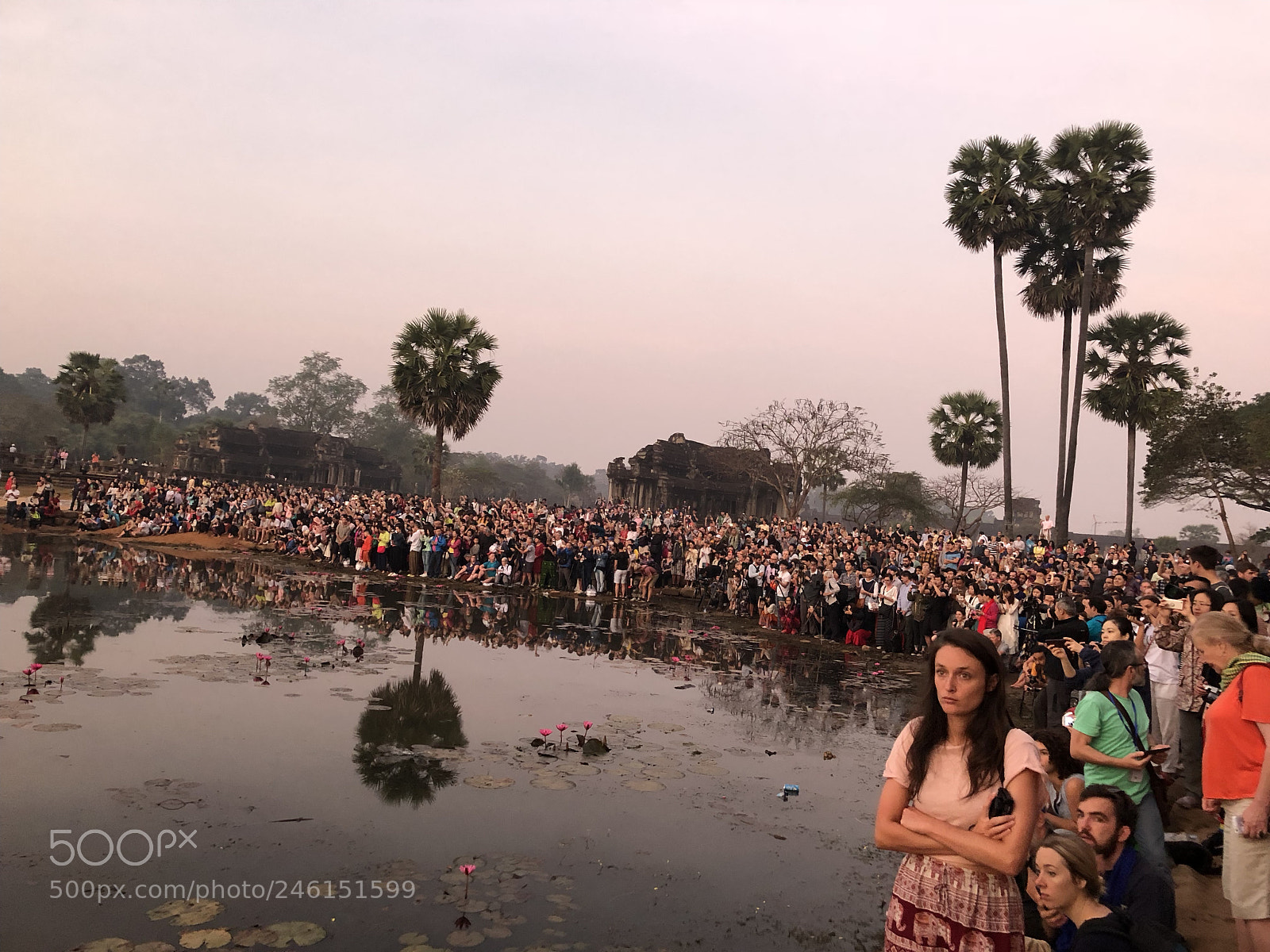Apple iPhone 8 Plus sample photo. People gathered around the photography