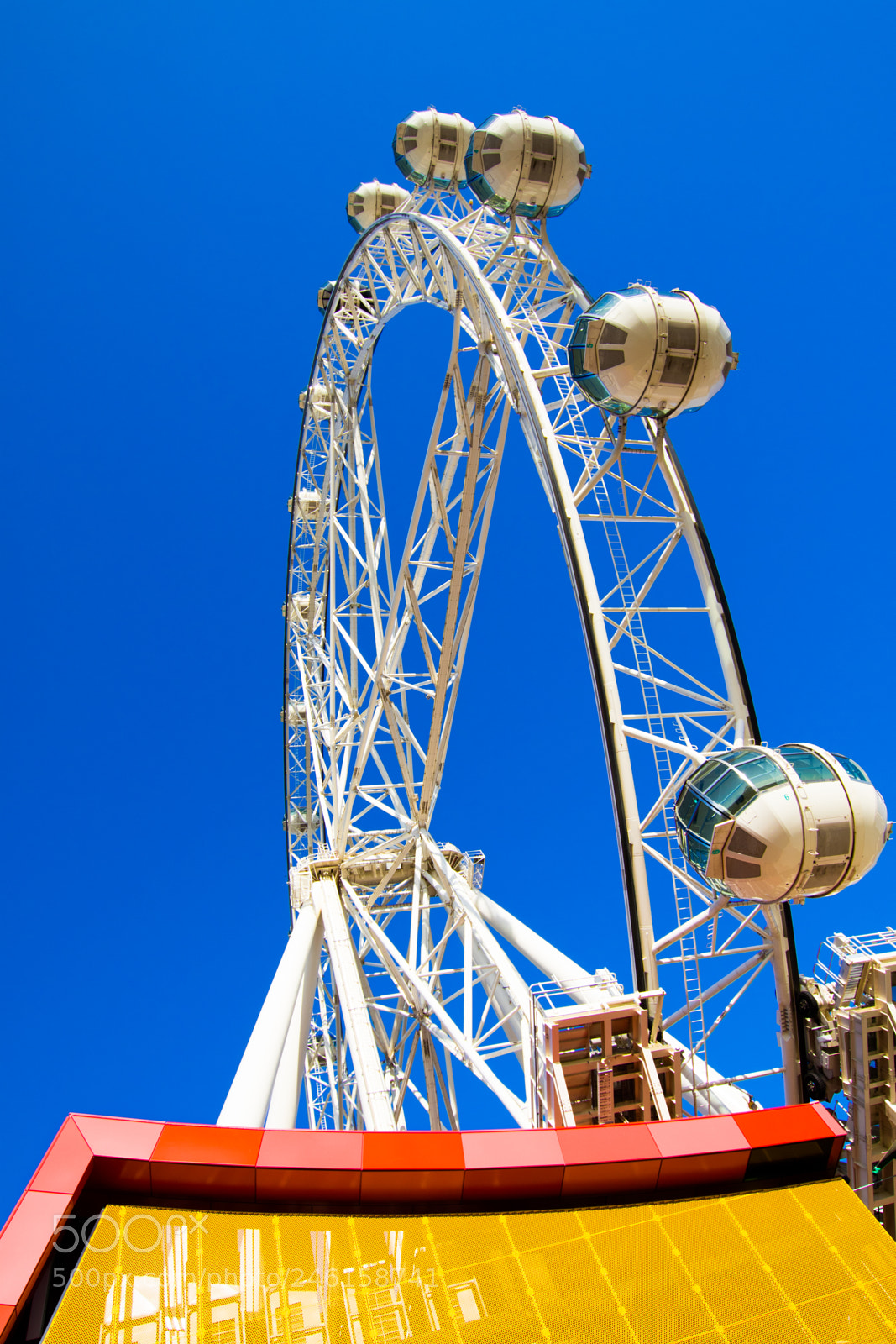 Canon EOS 7D Mark II sample photo. Wheel in blue photography