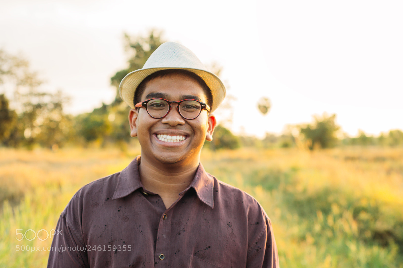 Nikon D3100 sample photo. Brown skin man smile photography