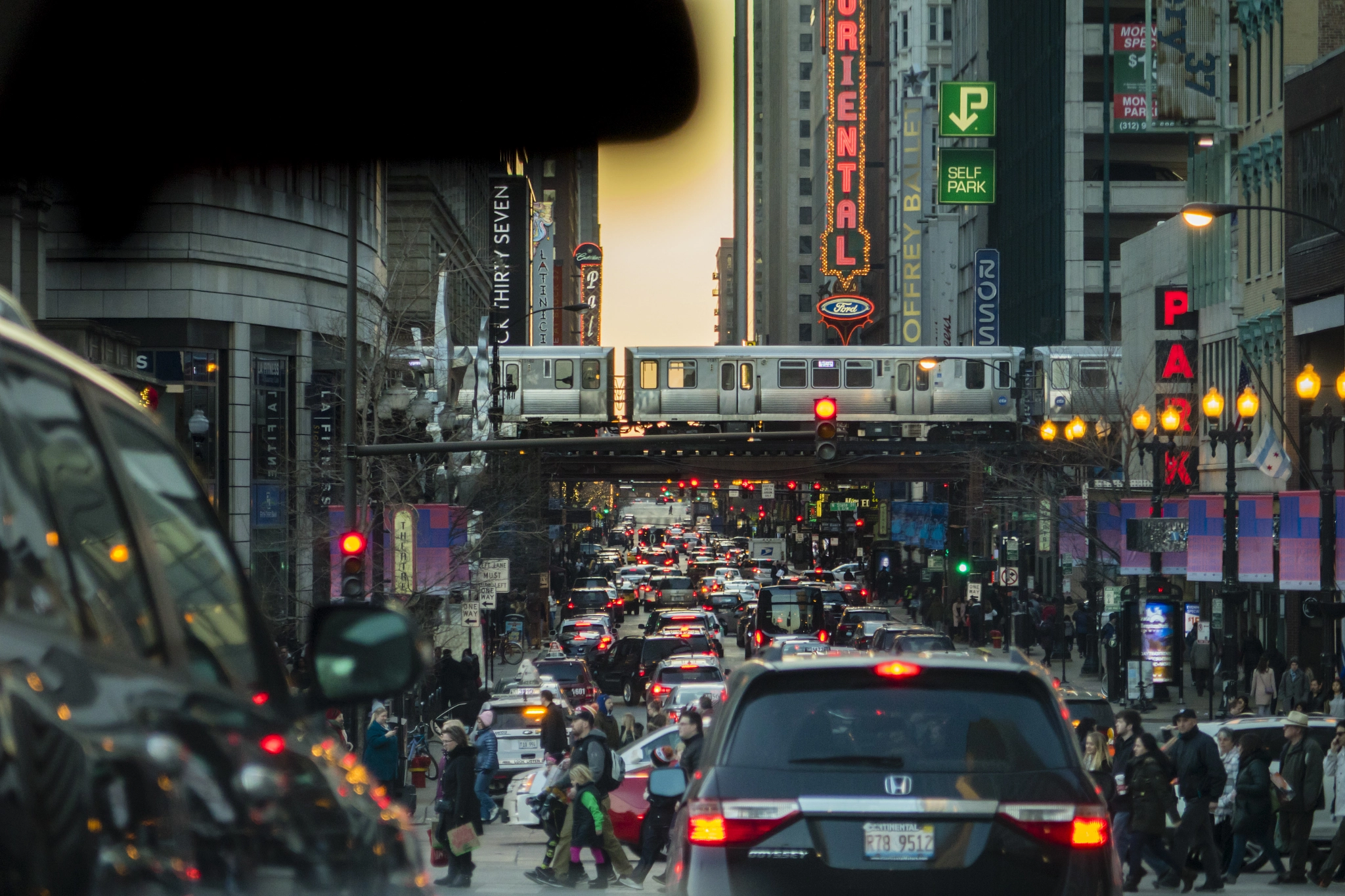 Sony Cyber-shot DSC-RX10 II sample photo. Chicago streets at sunset photography