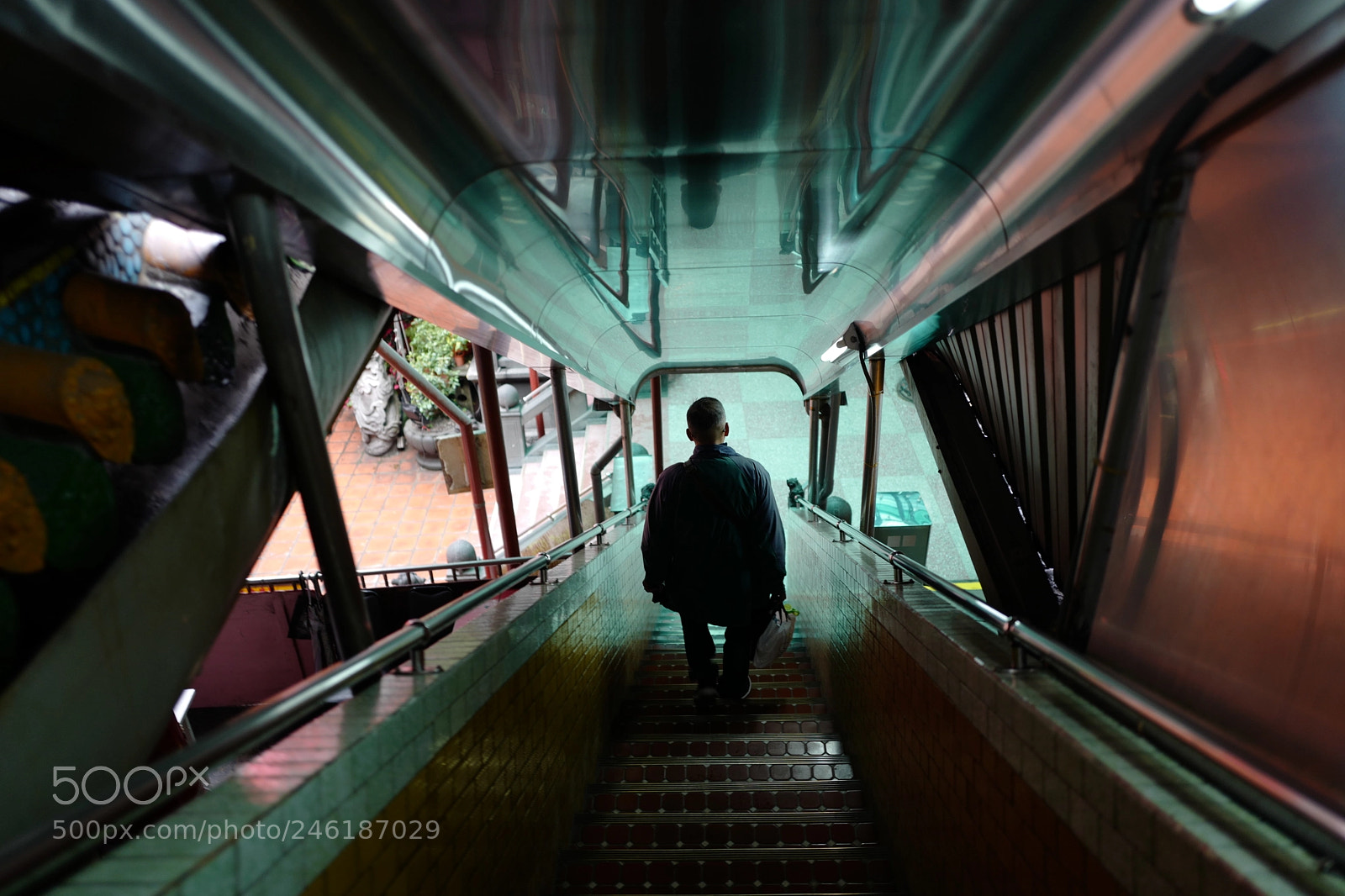 Leica Q (Typ 116) sample photo. A man walking down photography