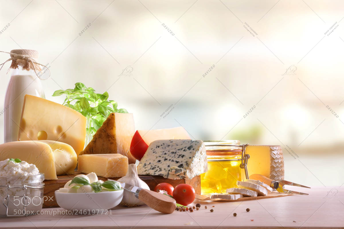 Nikon D810 sample photo. Cheeses presented on wooden photography