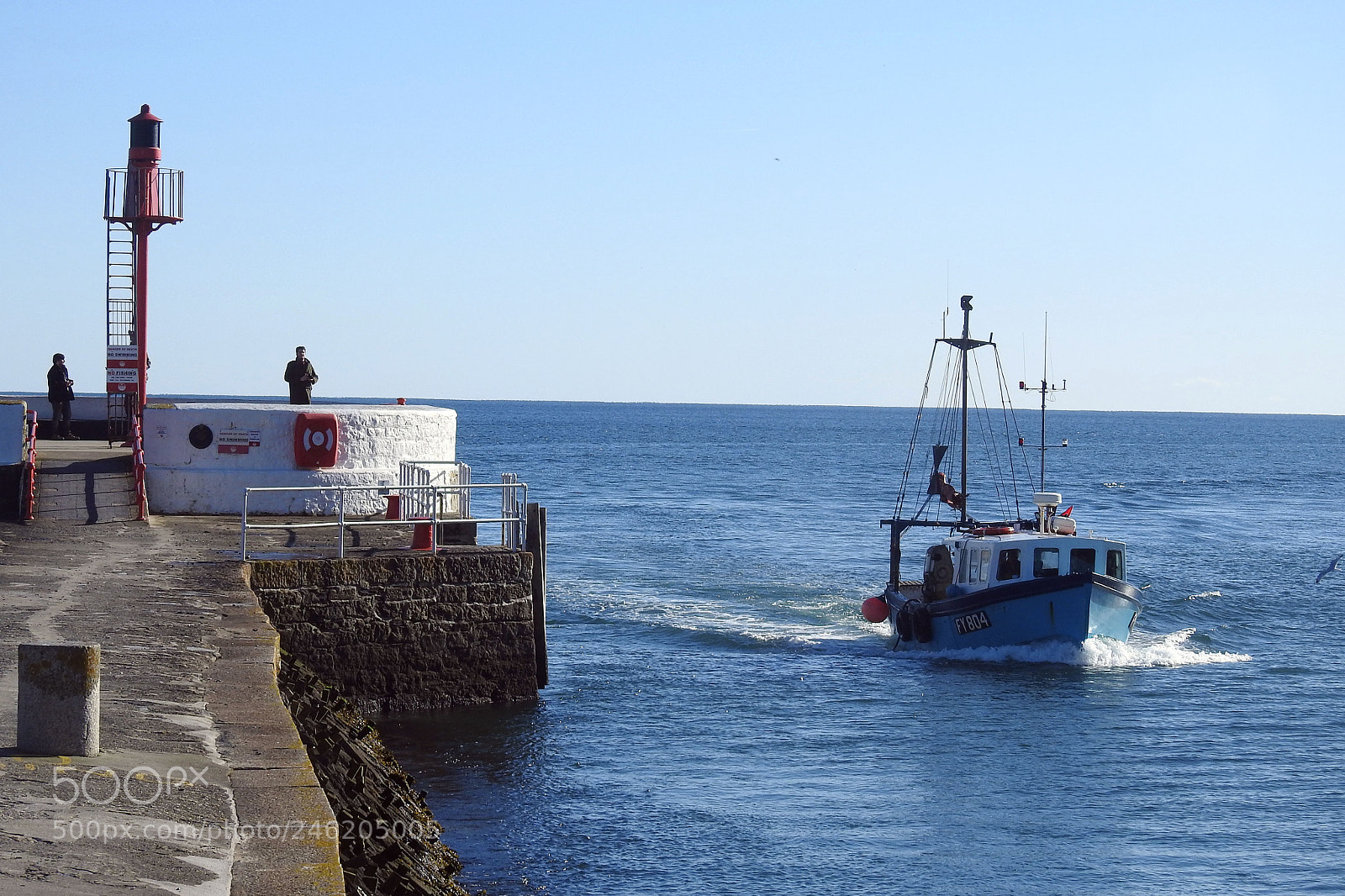 Nikon Coolpix P900 sample photo. Fishing boat returns photography