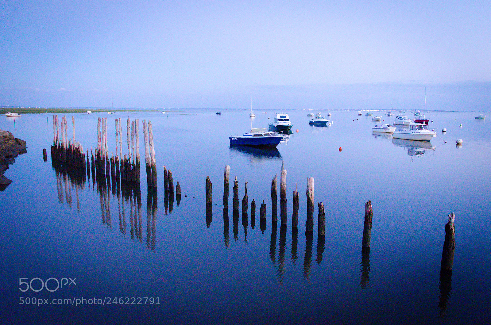 Nikon D5100 sample photo. Boats behind the fence photography