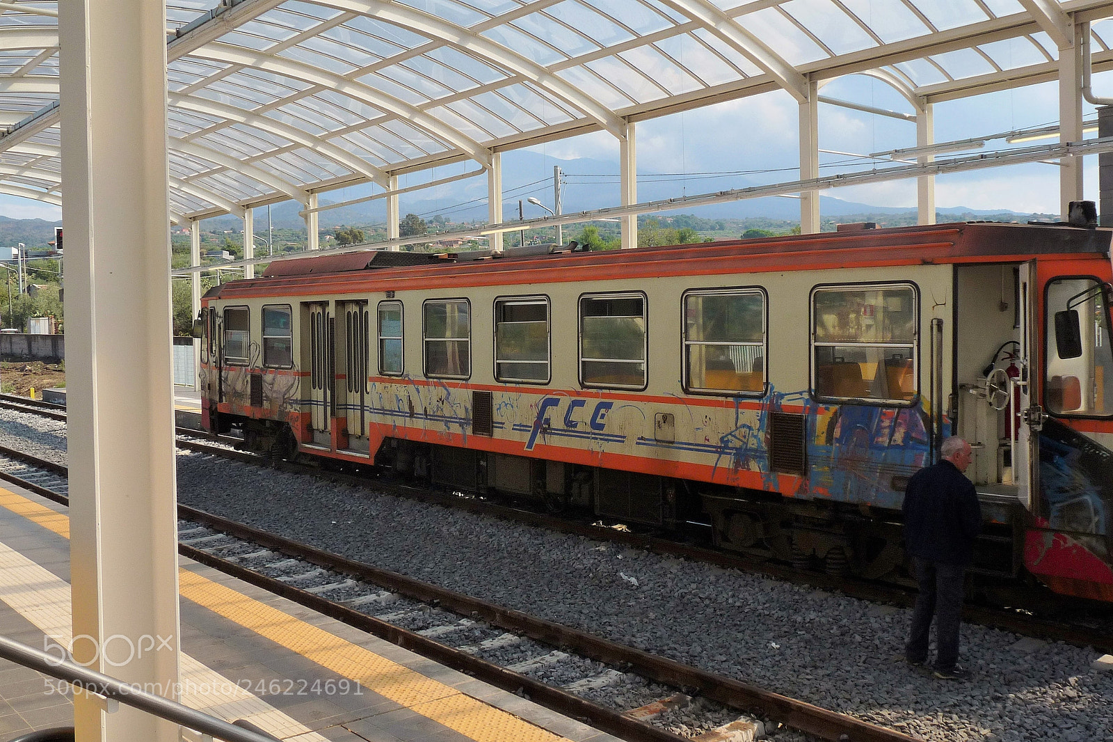 Panasonic Lumix DMC-FZ28 sample photo. Train to a smoking photography