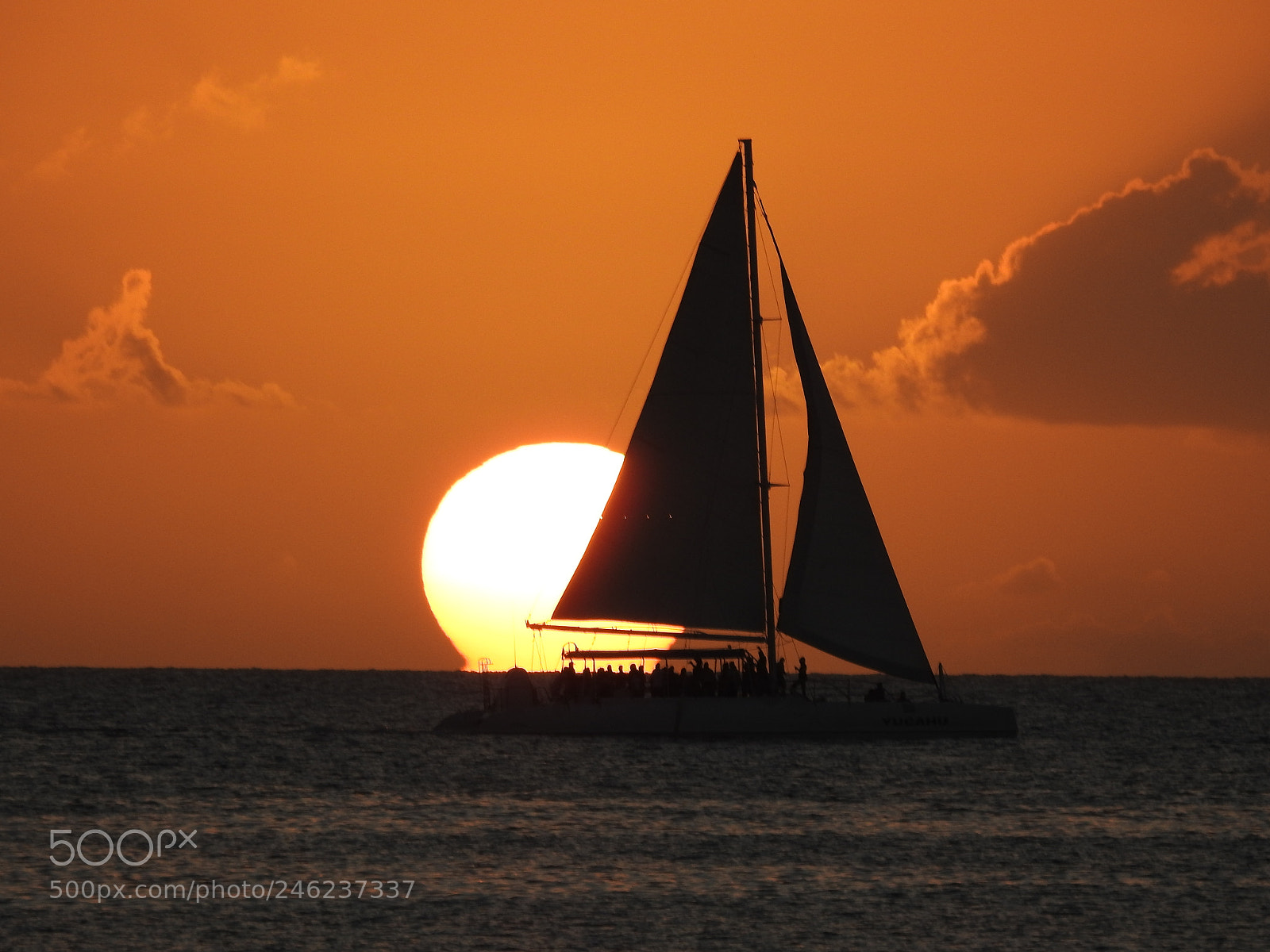 Nikon Coolpix P900 sample photo. Sailboat over sun photography