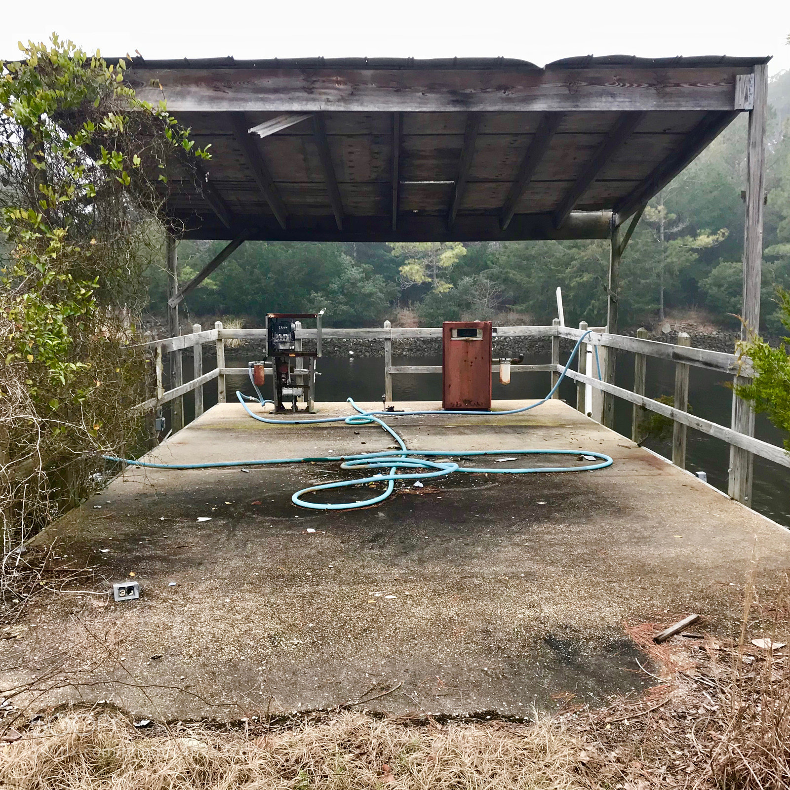 Apple iPhone 7 sample photo. Vintage waterside gas station photography