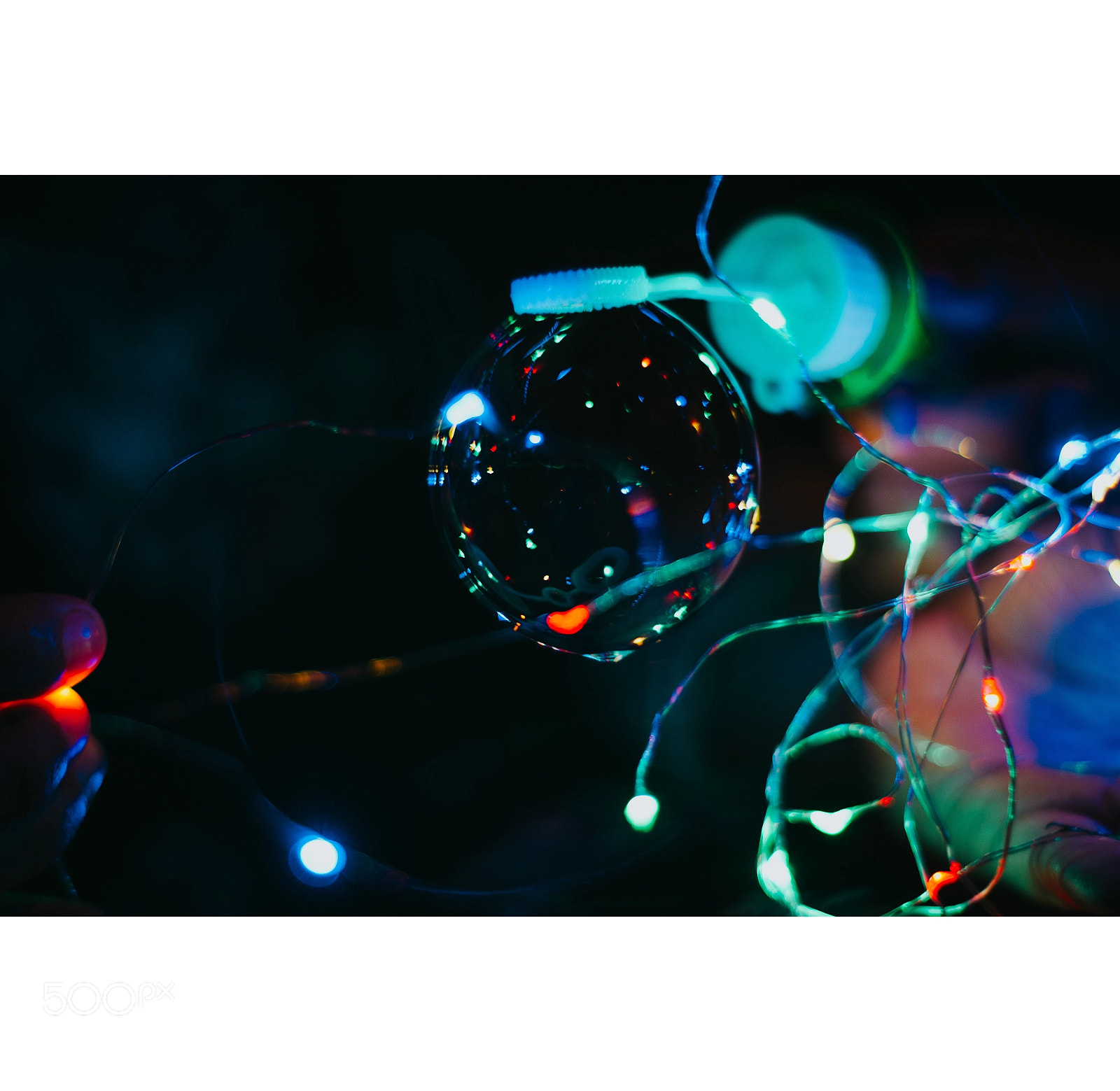 Nikon D5100 sample photo. Una burbuja en luces photography