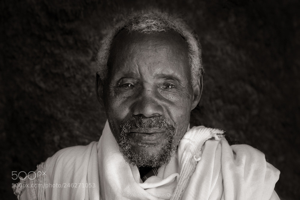 Fujifilm X-T2 sample photo. Ethiopian priest inside rock photography