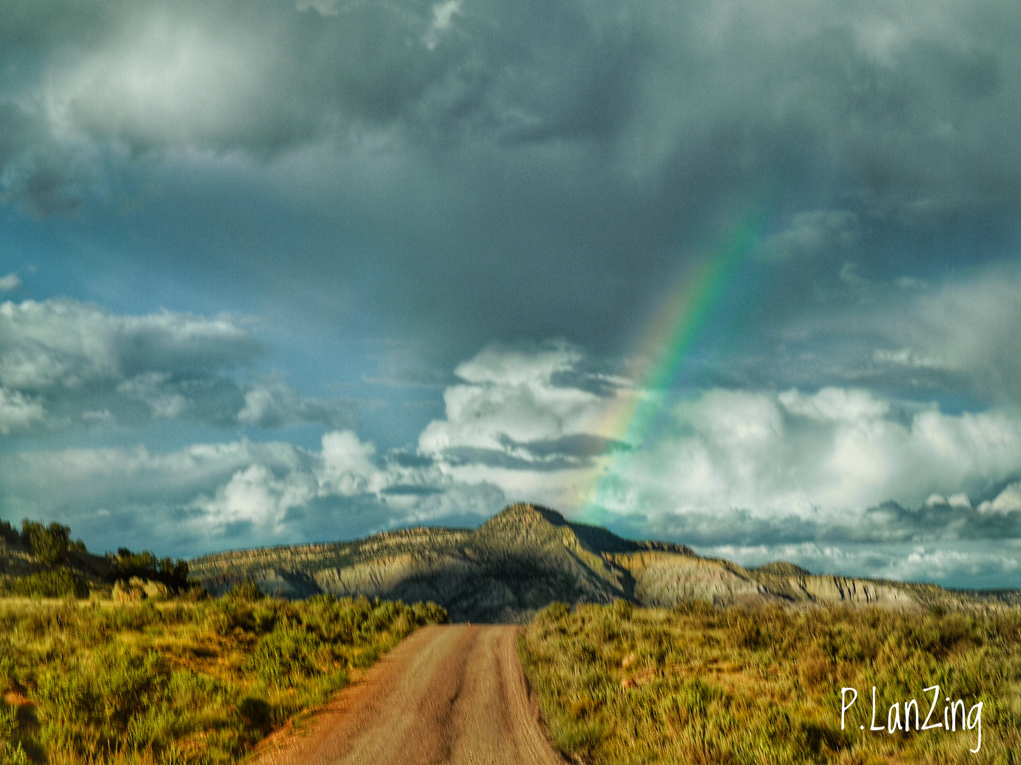 Panasonic Lumix DMC-L1 sample photo. Rainbow, ghost ranch, new mexico photography