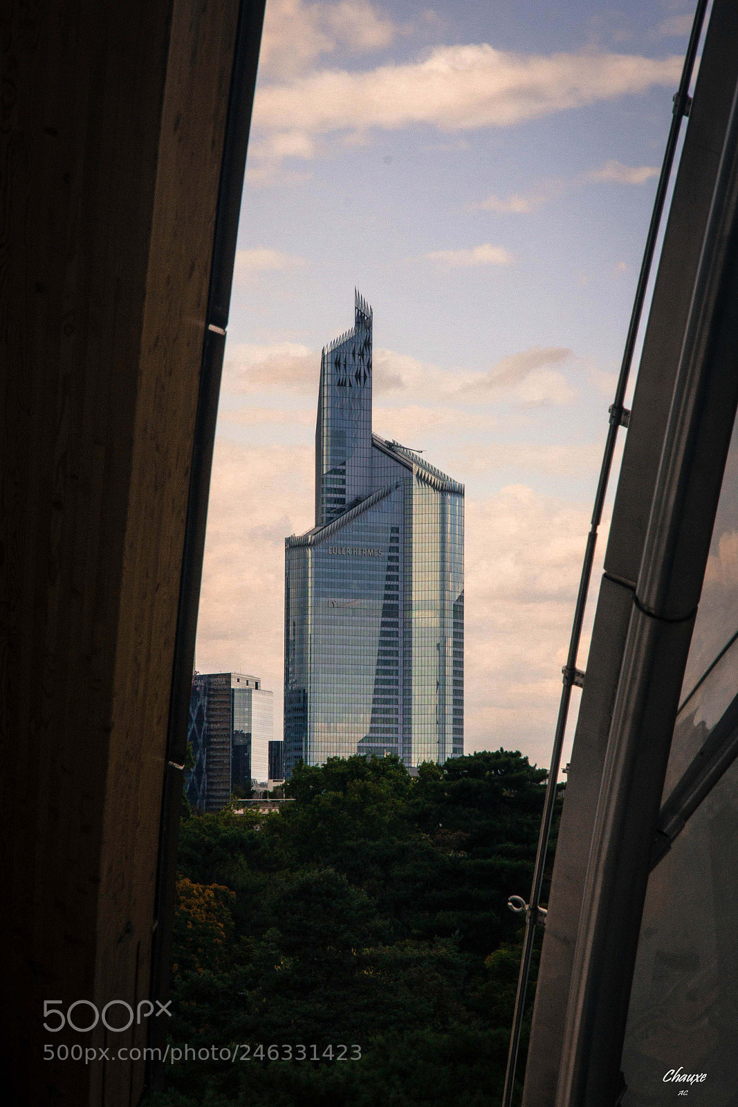 Canon EOS 60D sample photo. A building raising up photography