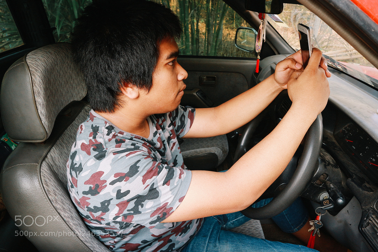 Canon EOS M10 sample photo. Unsafe driver using smart photography