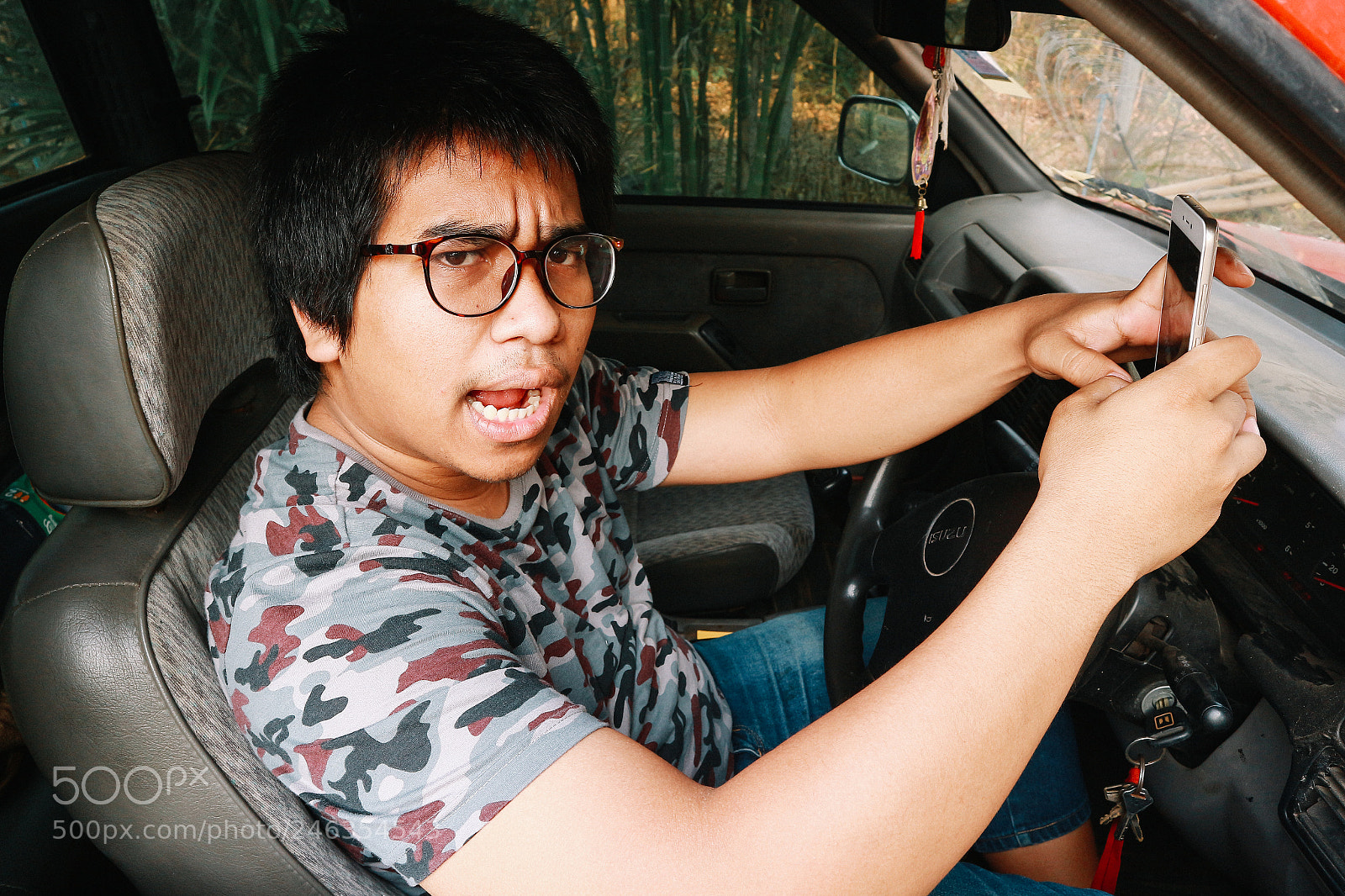 Canon EOS M10 sample photo. Unsafe driver using smart photography