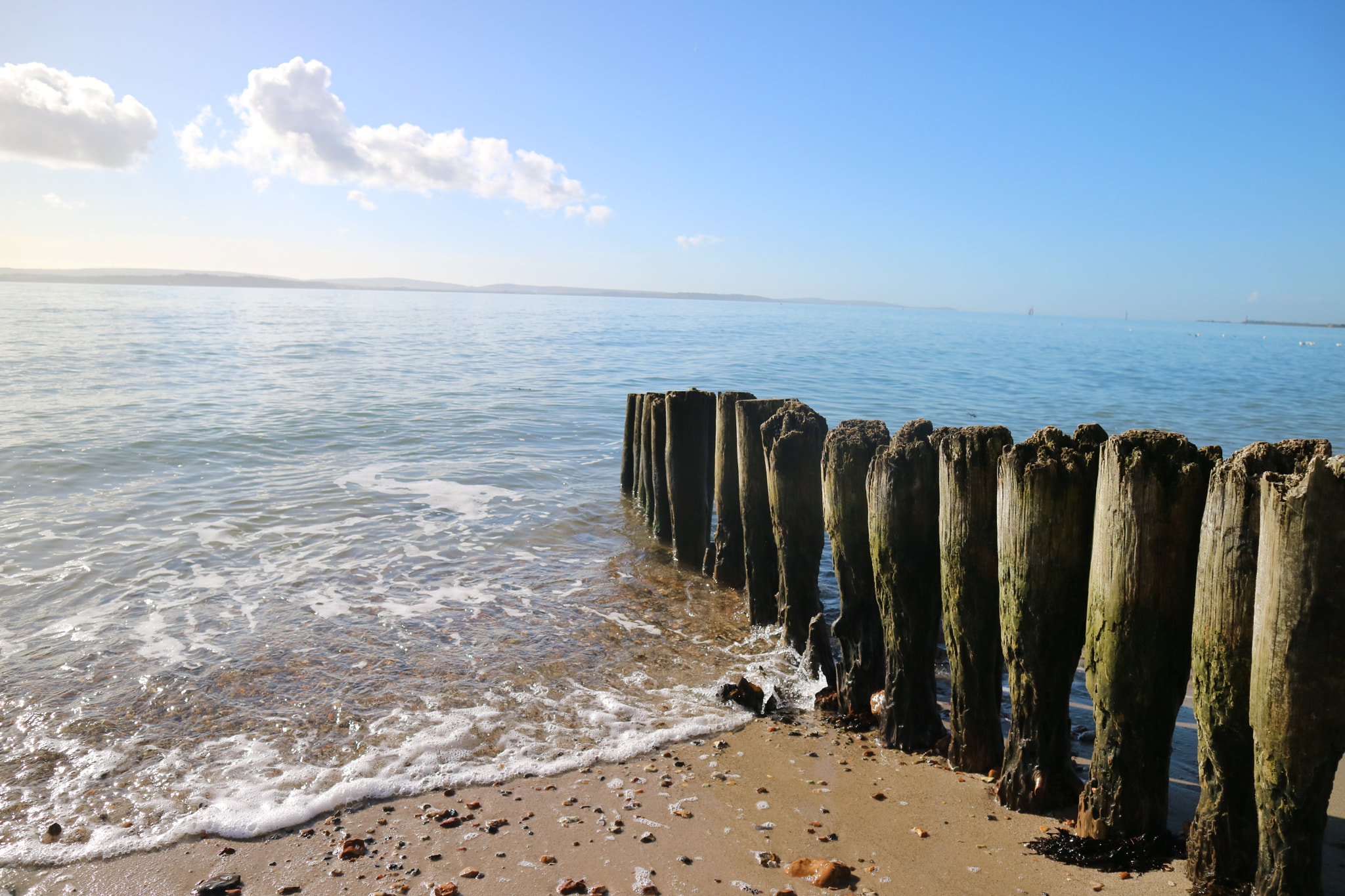 Canon EOS M3 sample photo. Wave break on a sunny beach photography
