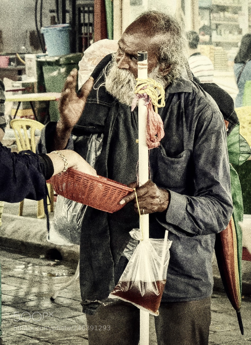 Panasonic Lumix DMC-GX85 (Lumix DMC-GX80 / Lumix DMC-GX7 Mark II) sample photo. Street beggar malaysia photography