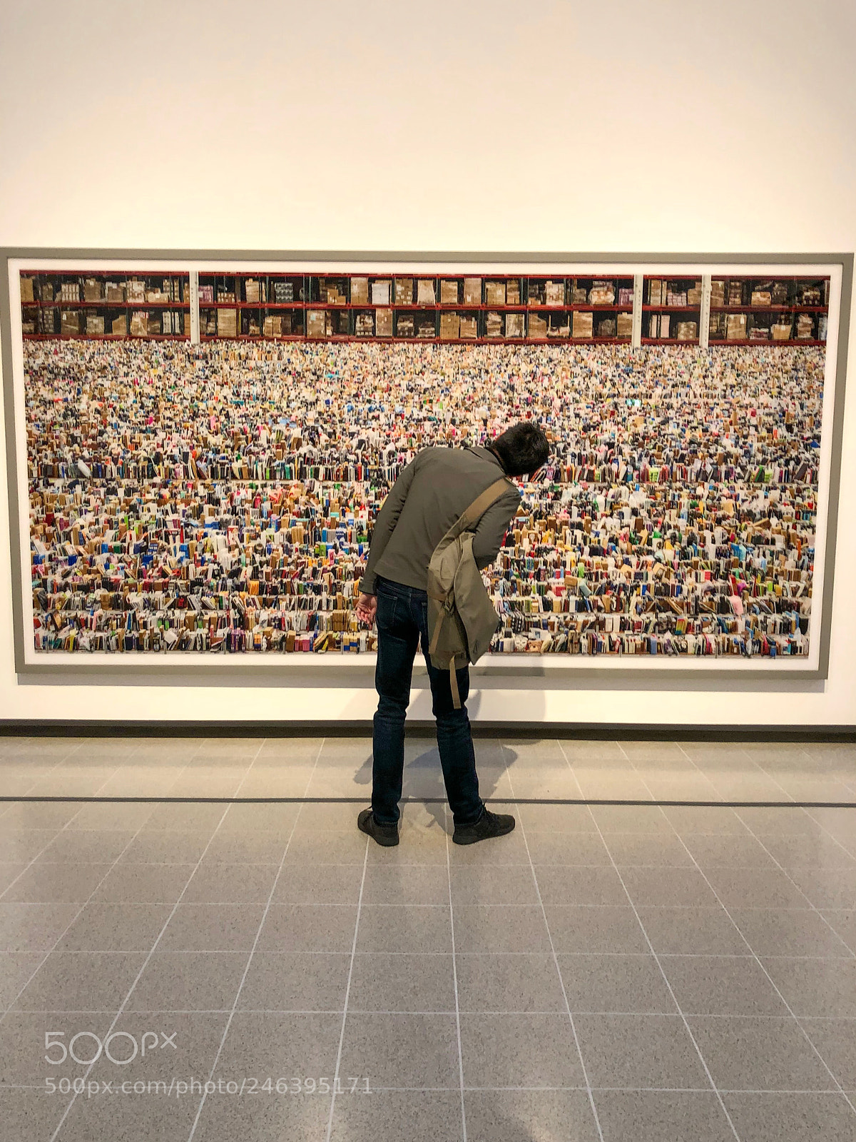 Apple iPhone X sample photo. Visitor admiring a photograph photography