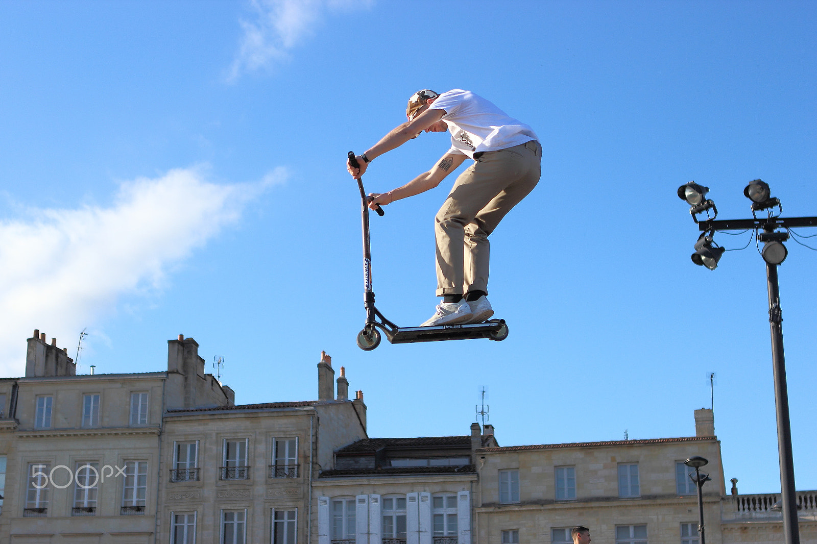 Canon EOS 600D (Rebel EOS T3i / EOS Kiss X5) + Canon EF 24-70mm F2.8L USM sample photo. Fly by skate scooter on docks at bordeaux 2 photography