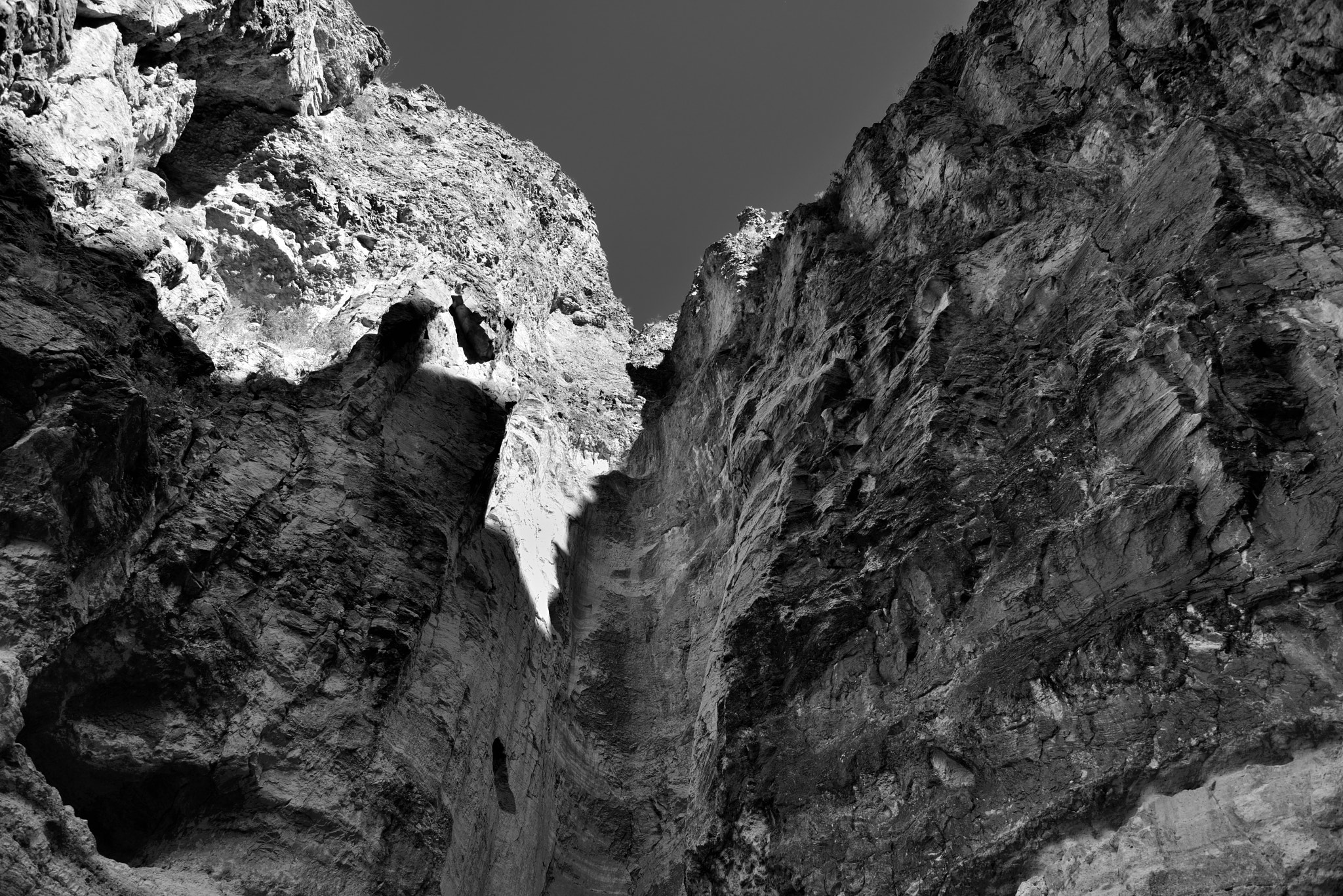 Nikon AF-S Nikkor 24-120mm F4G ED VR sample photo. The end of a trail and base of a 100-foot pour-off (black & white) photography
