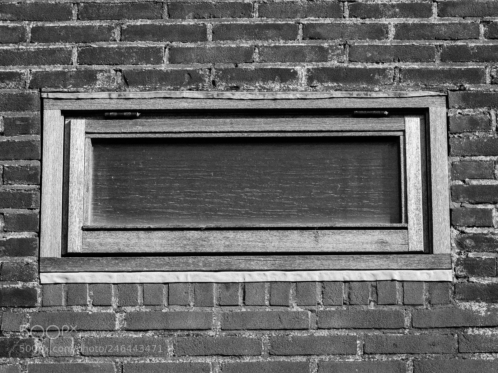 Canon PowerShot SX520 HS sample photo. Brick window photography